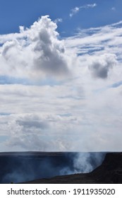 Volcanic Steam Floating Up To Fluffy White Clouds. Scenic Mount Kilauea On Big Island, Hawaii