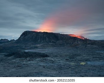 Volcano Crater And Hot Lava Fields.