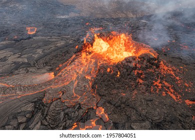 volcano eruption aerial view, Mount Fagradalsfjall, Iceland
				4K drone shot from Iceland of Hot lava and magma coming out of the crater, April 2021 
				