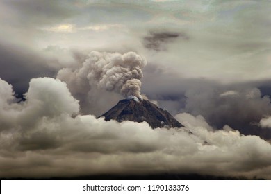 Volcano eruption of Merapi mount from Indonesia. Dark, gloomy, and cloudy.
