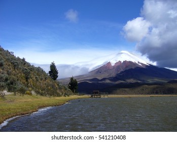 Volcano Mt. Cotopaxi In Ecuador With Lake Limpiopungo Inside The National Park