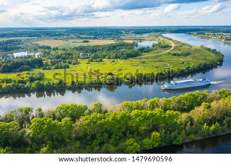 The Volga River, Russia. Tourist steamer floating on the Volga river channel, view from the quadcopter