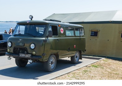 Volgograd, Central Embankment, Russia, June 22, 2021. UAZ Military Medical Vehicle And A Tent For Assistance.