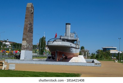 Volgograd, Russia, Central Embankment, September 16, 2020 River rescue steamer "Extinguisher". Monument to the sailors of the Volga military flotilla.