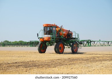 Volgograd, Russia - JULY 31, 2014: Demonstration of agricultural machinery in "Fild Days" -annual review of agricultural machinery, it took place on July 31 - August 1, 2014, Volgograd, Russia