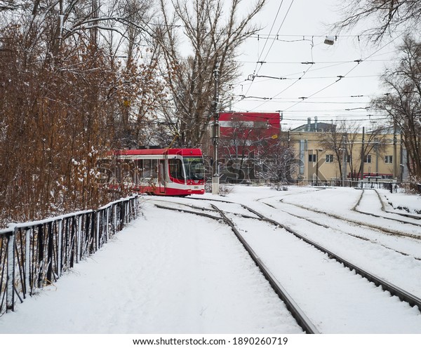 Volgograd, Traktorozavodsky district, Russia,\
January 12, 2020. City electric transport. Winter, tram movement on\
snow-covered rails.
