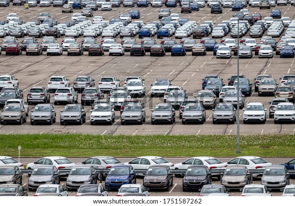 Volkswagen Group
Rus, Russia, Kaluga  - MAY 24, 2020: Rows of a new cars parked in a
distribution center on a cloudy day in the spring, a car factory.
Parking in the open
air.