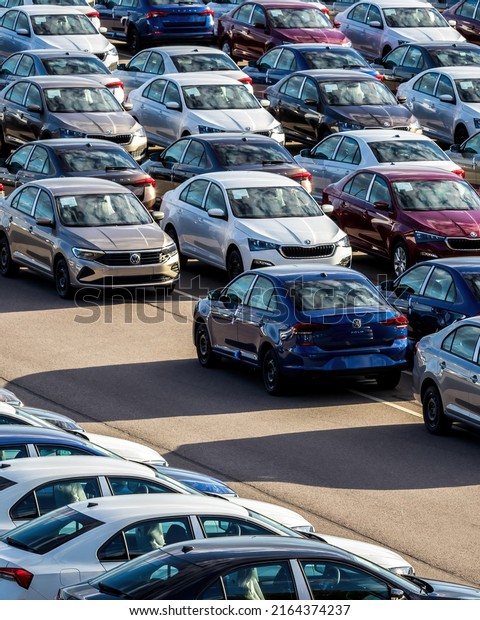 Volkswagen Group Rus, Russia, Kaluga - MAY 25,
2020: Rows of a new cars parked in a distribution center on a car
factory parking.