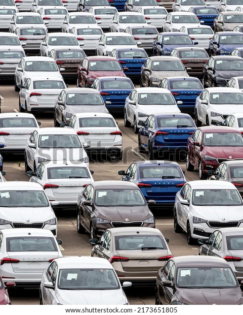 Volkswagen Group Rus, Russia, Kaluga - MAY 25,\
2020: Rows of a new cars parked in a distribution center on a car\
factory parking.