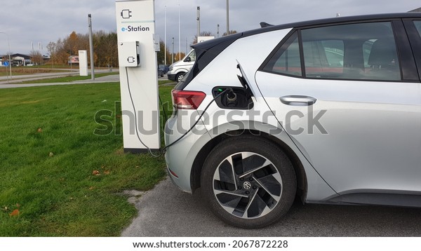 Volkswagen ID3 Electric\
car VW showroom exterior interior emblem logo charging in Orebro\
Sweden on 20.10.2021