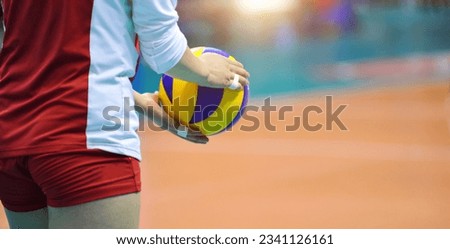 Volleyball ball in the hand of a volleyball player