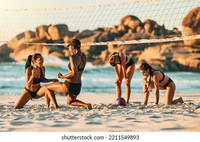 Volleyball, beach and winner with a friends team in celebration of a win on the sand during summer. Teamwork, motivation and competition with sports woman by the sea or ocean for a partner game - Powered by Shutterstock