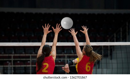 Volleyball Game Sport With Group Of Girls Indoor 