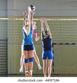 Volleyball Game Sport With Group Of Girls Indoor In Sport Arena