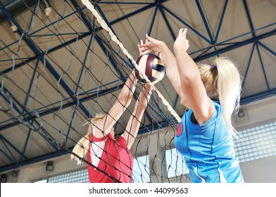 Volleyball Game Sport With Group Of Girls Indoor In Sport Arena