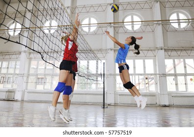 Volleyball Game Sport With Group Of Girls Indoor In Sport Arena