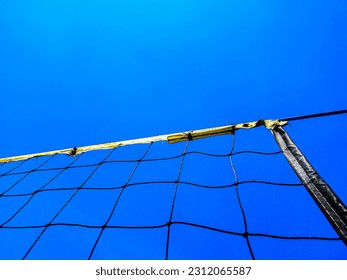 Volleyball net with blue sky background - Shutterstock ID 2312065587