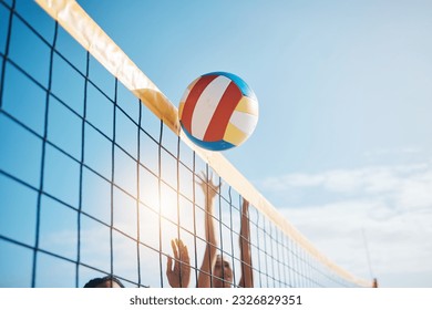 Volleyball, net with sports and fitness, blue sky and people outdoor playing game with training and summer. Exercise, athlete and competition, match with ball and active, workout and team tournament