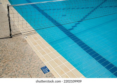 Volleyball Net In The Swimming Pool