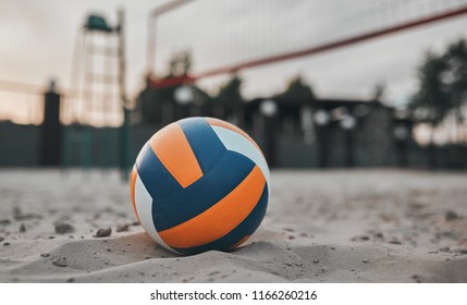 Volleyball playground. Close-up of volleyball ball lying on sand.