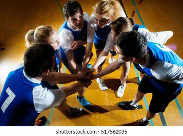 Volleyball Team Having Team Huddle