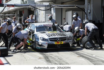 VOLOKOLAMSK, MOSKOW REGION - JULY 13, 2014: DTM (Deutsche Tourenwagen Masters) Moscow Raceway. Replacing Car Tires