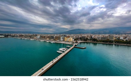 Volos, Greece - November 2019: Aeral Cityscape View Of Volos City, Greece During Winter Period. Centered The Argo Wooden Boat To Be Part Of The Festive Decoration In View Of Christmas