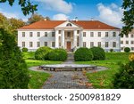 Voltveti manor house built in the Late Classicism style, Estonia. The manor is surrounded by a park with 150 different species of trees.