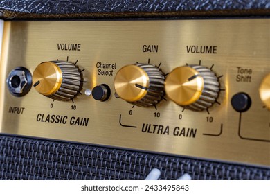 volume control panel, Close-up of a guitar tube amplifier