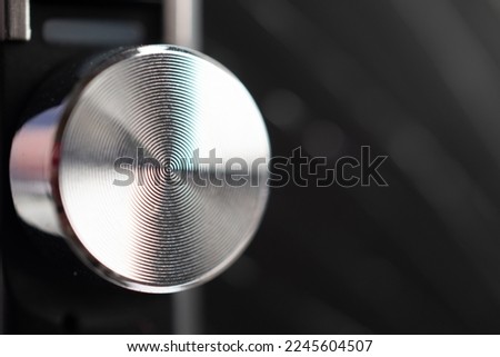 volume controller button on music system