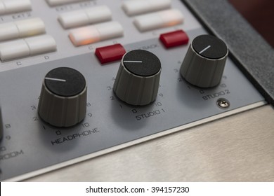 Volume Dials On An Audio Mixing Board