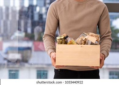 Volunteer With Box Of Food For Poor. Donation Concept.