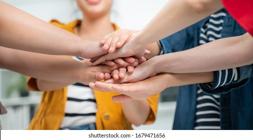 Volunteer charity work join hand together concept.Business friend colleagues hand join together for successful business achievement,cooperation success.businesspeople partners hand join for success.