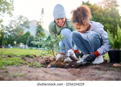 Volunteer, child and woman with plant for gardening in park with trees in nature environment. Happy family team helping and planting for growth, ecology and sustainability for community on Earth day - Powered by Shutterstock