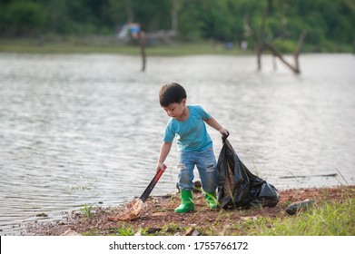 Volunteer children collecting rubbish on the river - Powered by Shutterstock