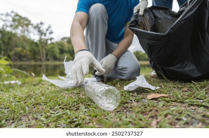 Volunteer Couple Collecting Trash in Nature, Environmental Conservation, Community Cleanup Effort, Eco-Friendly Activity, Outdoor Volunteering - Powered by Shutterstock