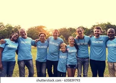 Volunteer group of people for charity donation in the park - Powered by Shutterstock