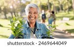 Volunteer, portrait or happy woman with plants at park for gardening, earth day or sustainability in nature. Ecology, face or mature person with tree for environment conservation or community service