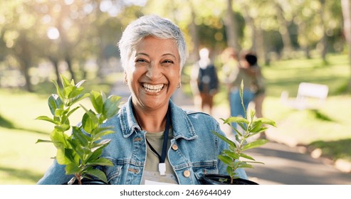 Volunteer, portrait or happy woman with plants at park for gardening, earth day or sustainability in nature. Ecology, face or mature person with tree for environment conservation or community service - Powered by Shutterstock