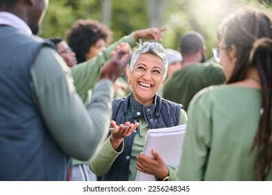 Volunteer, team and people in nature for community service, teamwork and planning with leadership, goals and strategy. Senior person or leader for management in forest, park or eco friendly project - Shutterstock ID 2256248345
