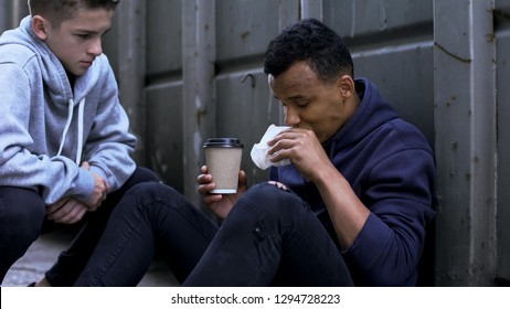 Volunteer Treating Afro-american Homeless With Free Lunch, Kindness And Charity