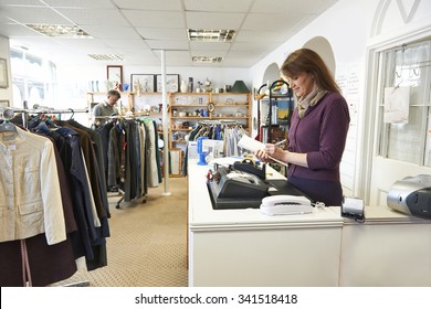 Volunteer Working In Charity Shop