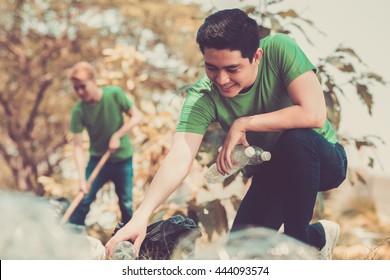 Volunteers picking up litter in the park