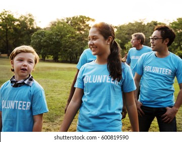 Voluteer Group Of People For Charity Donation In The Park