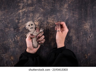 Voodoo Doll. Black Magic Esoteric Ritual. Halloween Concept.