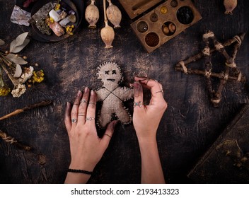 Voodoo Doll. Black Magic Esoteric Ritual. Halloween Concept.