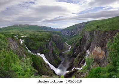Voringsfossen waterfall with on the right the river Bjoreia and on the left the Tyssvikjo fall. The Bjoreia steeps down in the 2-300 metres deep valley .

