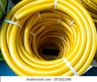 Voronezh, Russia - February 29, 2020: New Watering Hose Coiled Up Top View