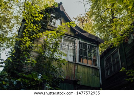 Voronezh, Russia July 22, 2019: Village house in the forest in cloudy weather.