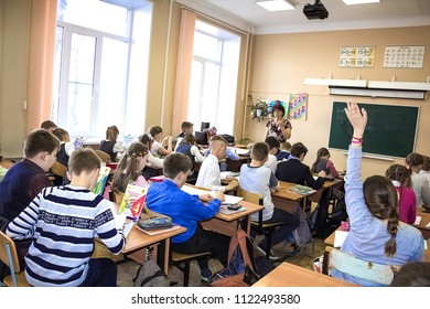Voronezh, Russia, May 2018: School, class, many children. The teacher explains the lesson. - Shutterstock ID 1122493580